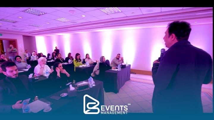 Session room with purple uplighting at AQ Preserving Excellence Egypt 2024