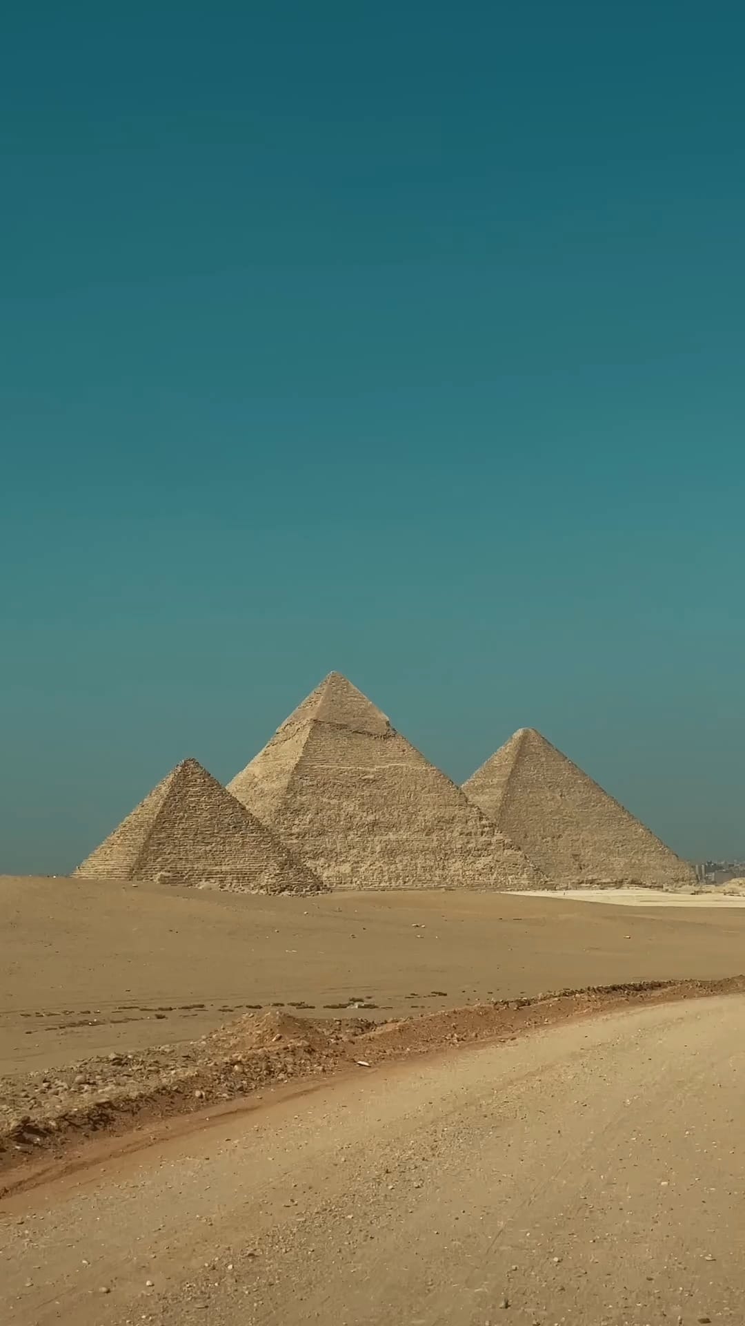 The Great Pyramids of Giza under a clear sky — backdrop of the ICCE closing gala